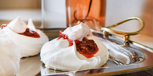 Pavlova with Rhubarb Compote Image Pavlova with Rhubarb Compote Image